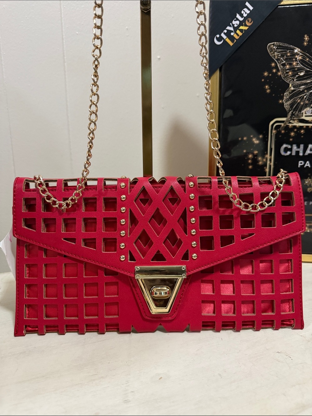 Geo du Jour Red Laser Cutout Clutch with Gold Shoulder Strap